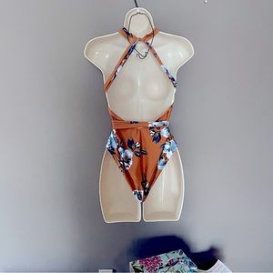 Small one piece swimsuit by Kamoni.